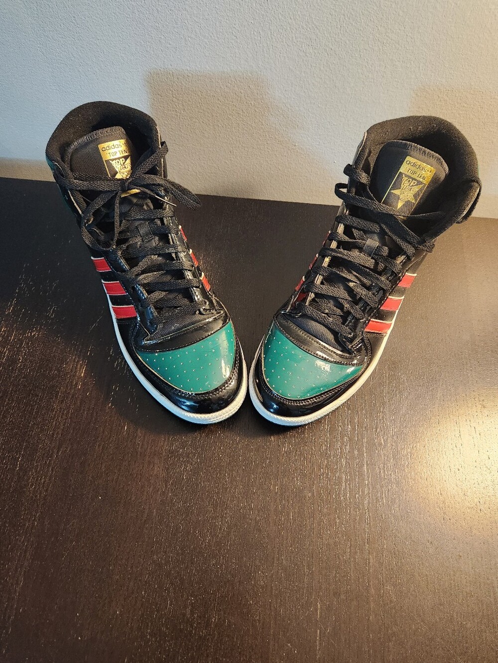 adidas Black High-Top Ten Sneakers with Green Toe and Red Stripes. Classics